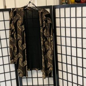 - VintageEvening wear jacket measures like a medium